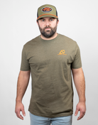 Man wearing military green tee with small Archery Country logo on left chest