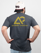 Rear view of man wearing charcoal tee with "Archery Country" logo on back