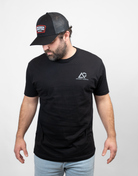 Man wearing black tee with small Archery Country logo on left chest