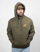 Man wearing a green hoodie with an orange Archery country logo on left chest