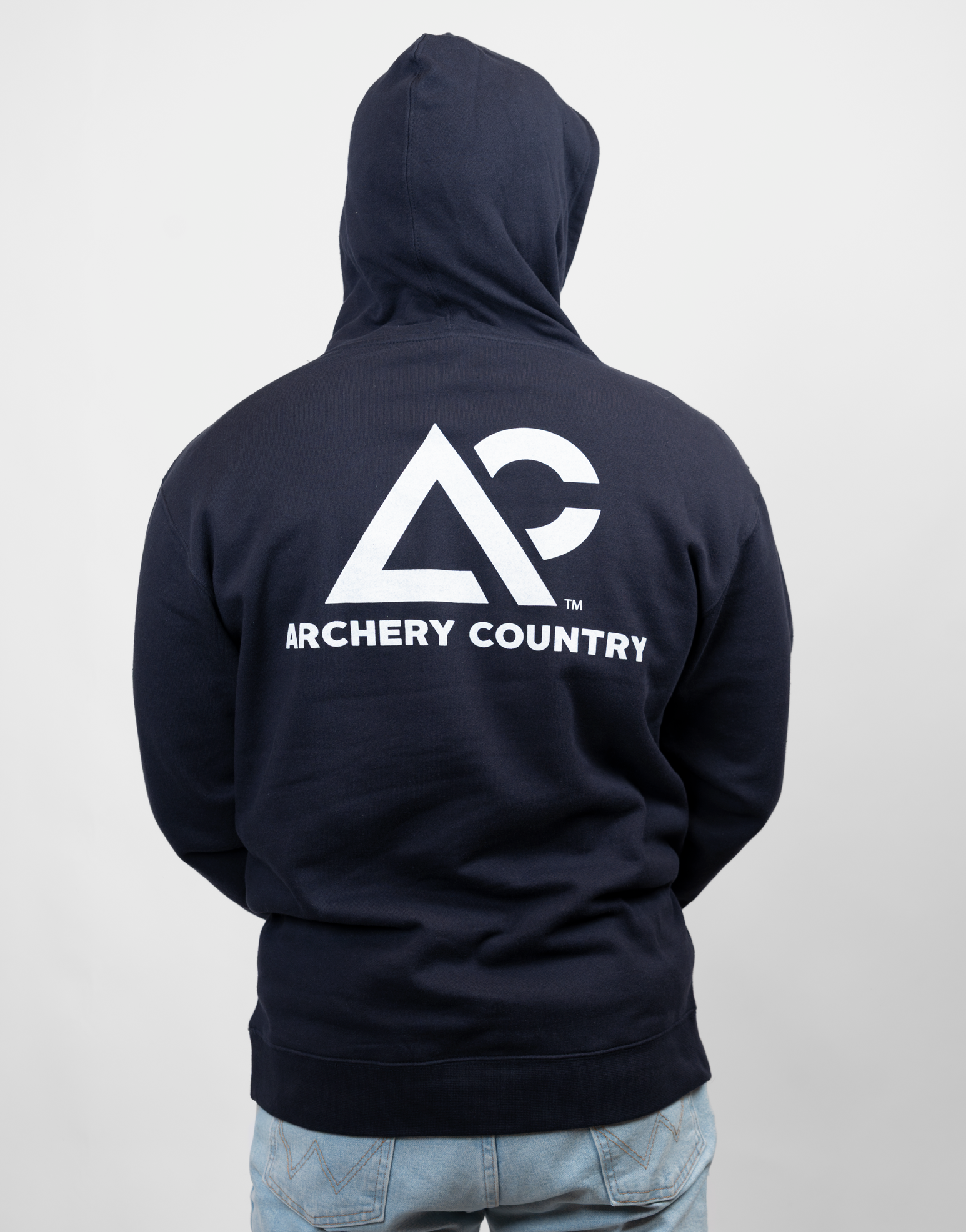 rear view of navy hoodie with white "Archery Country" logo on back