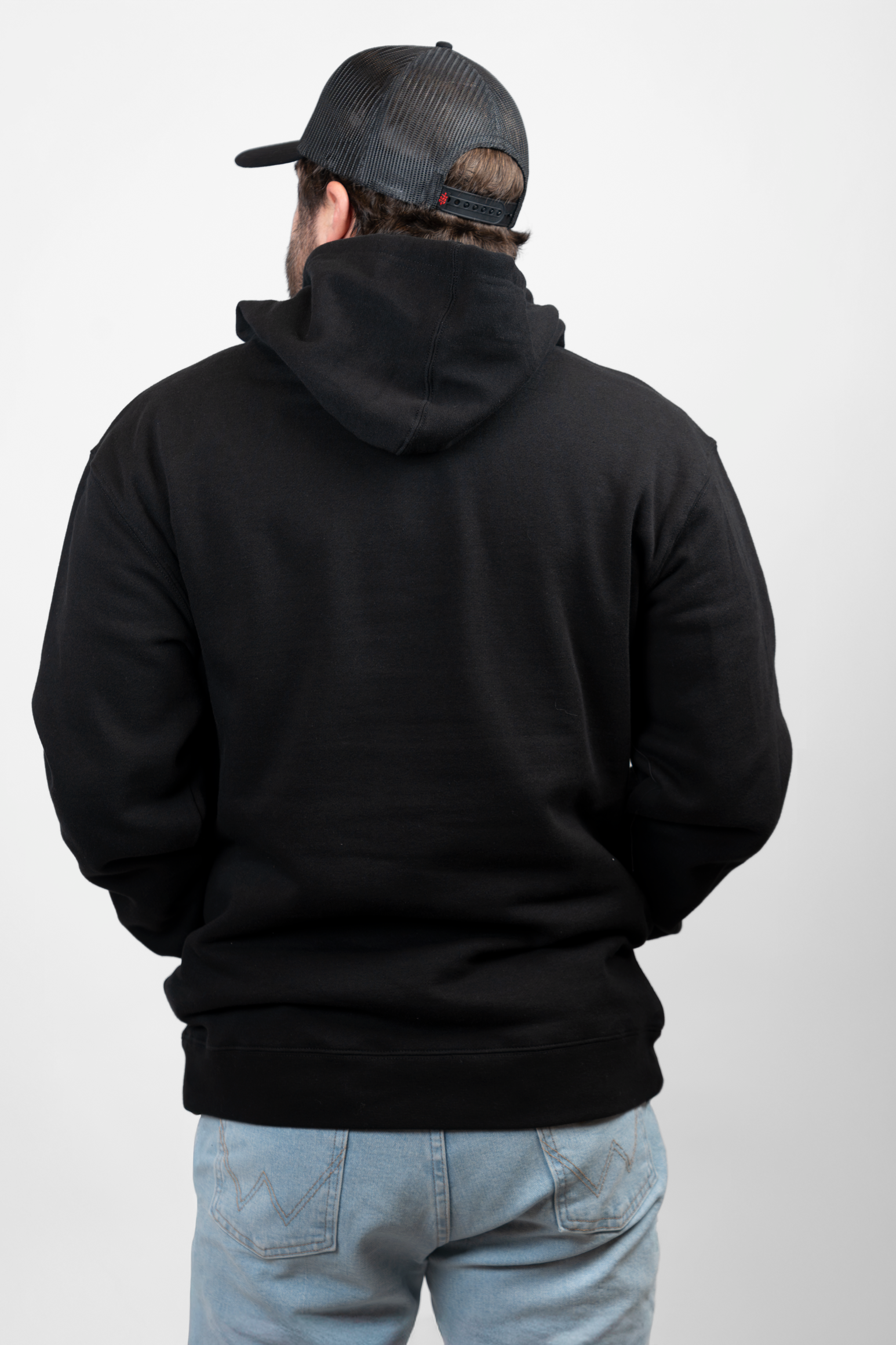 Rear view of man in black hoodie