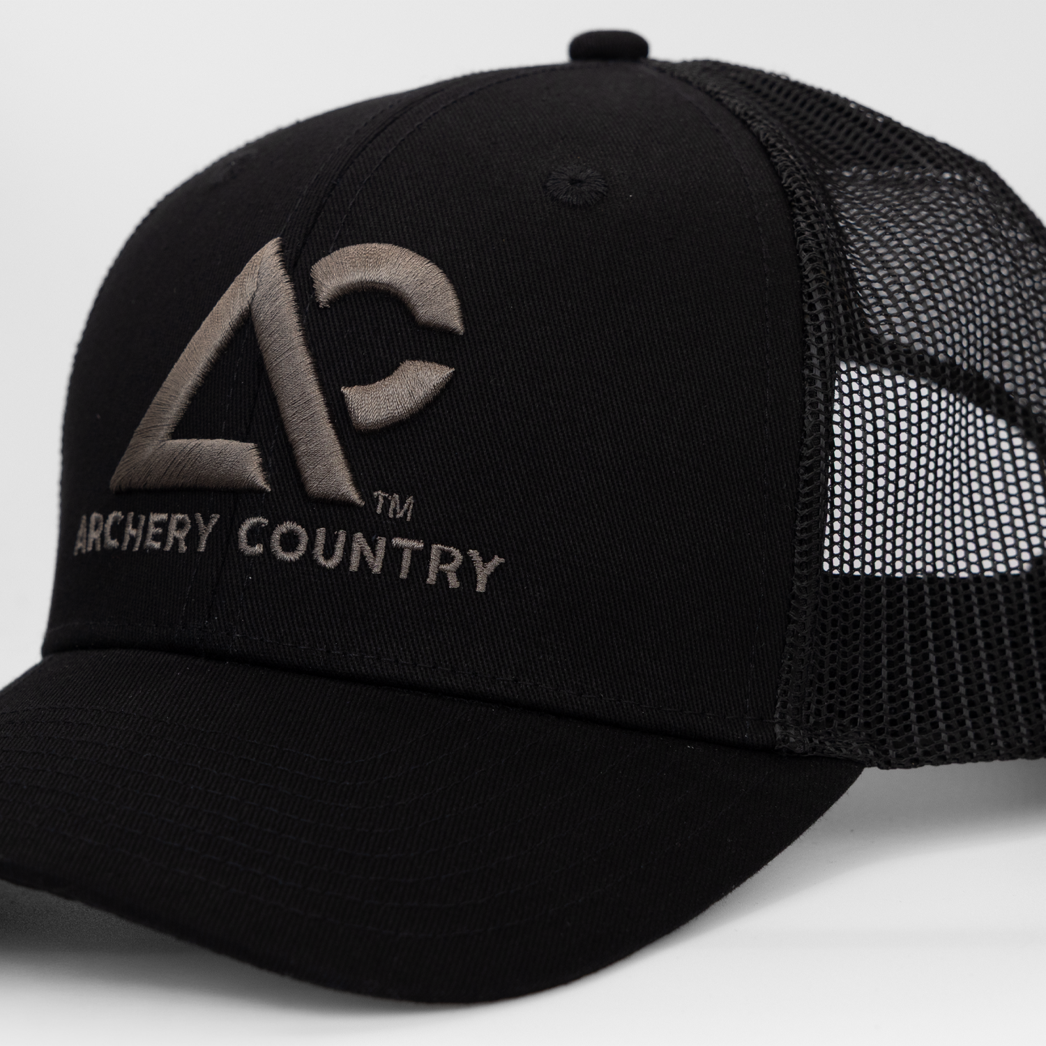 Black meshback cap with "ARCHERY COUNTRY" logo on front